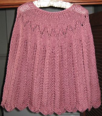 PobbyPoncho with striped lace and bobble hem